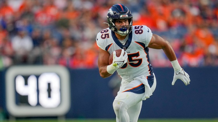 Denver Broncos tight end Albert Okwuegbunam runs against the Los Angeles  Rams during the first half of an NFL preseason football game Saturday, Aug.  26, 2023, in Denver. (AP Photo/Jack Dempsey Stock