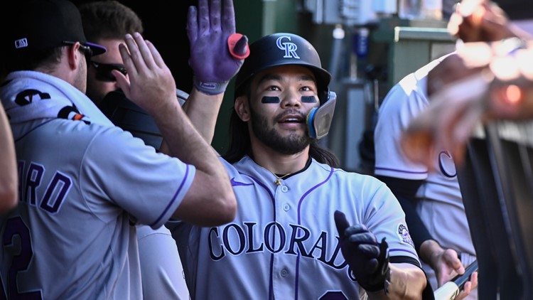 Joe, Grichuk lead Rockies over Cubs 4-3 for rare road win