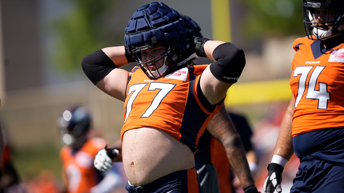 Denver Broncos guard Quinn Meinerz (77) takes part in drills