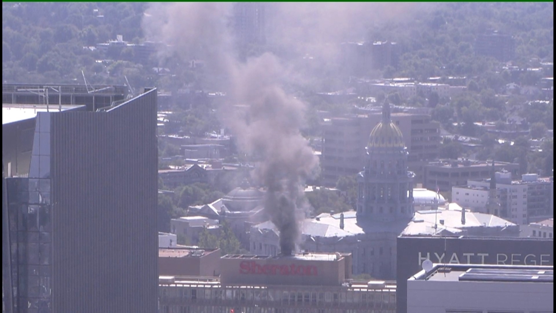 RAW Plume of smoke visible in downtown Denver