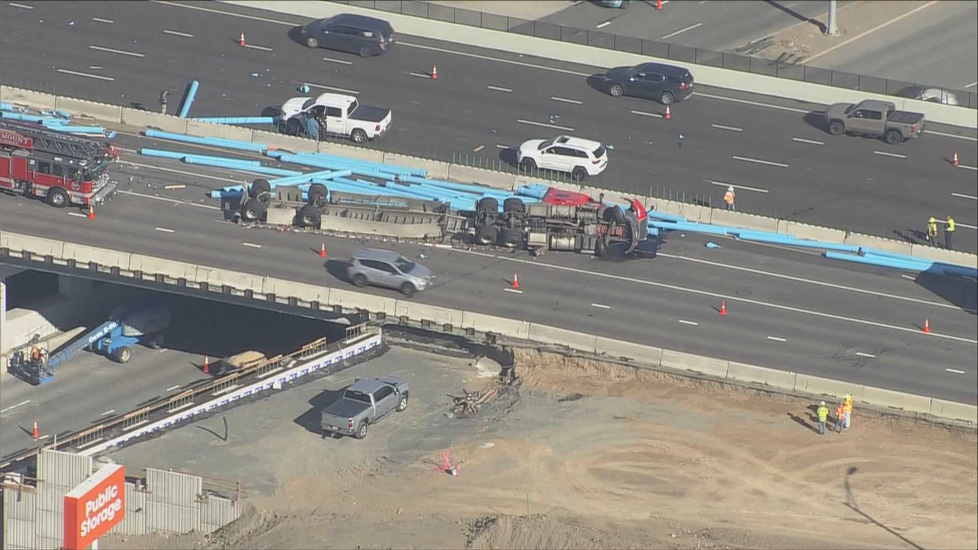 3 people killed by debris after semi-truck rolled over on I-70 | 9news.com