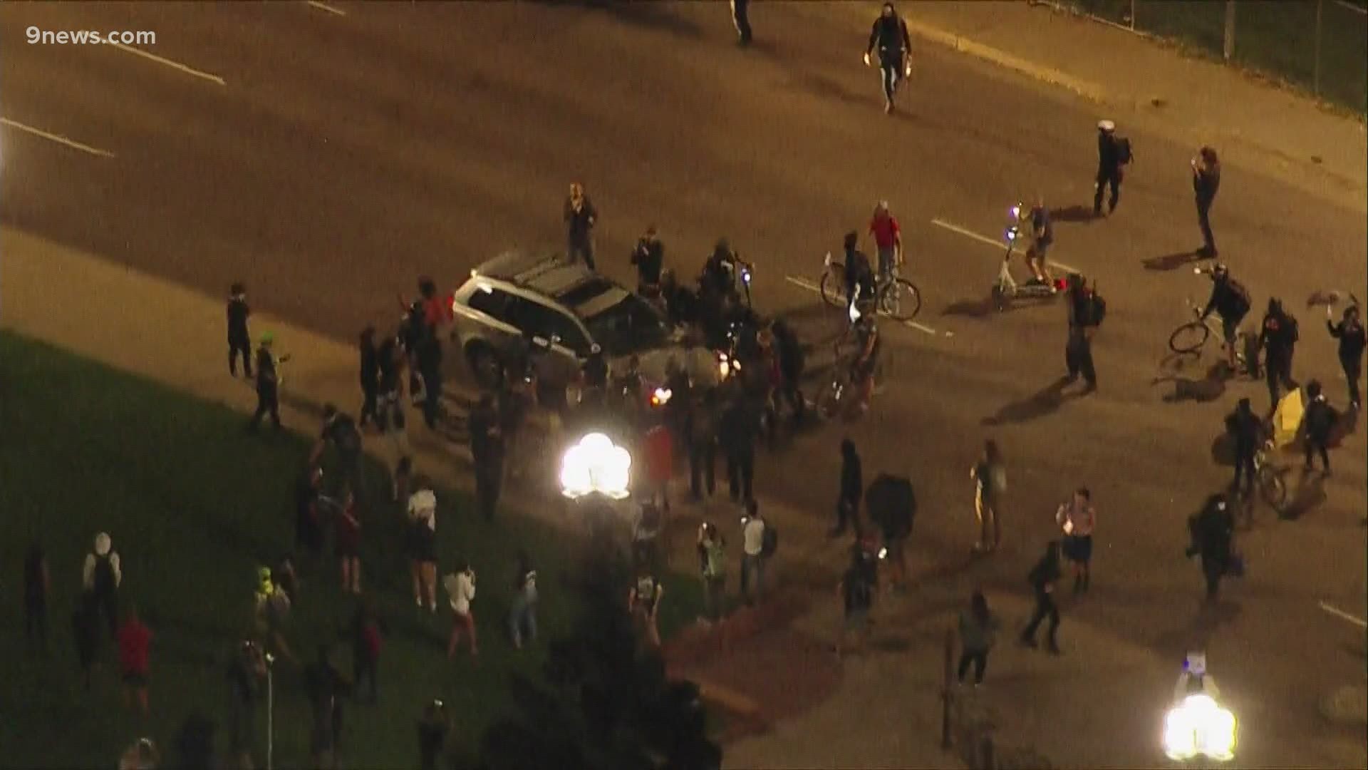 A large group dispersed earlier Wednesday night, then a small group moved toward a police precinct.