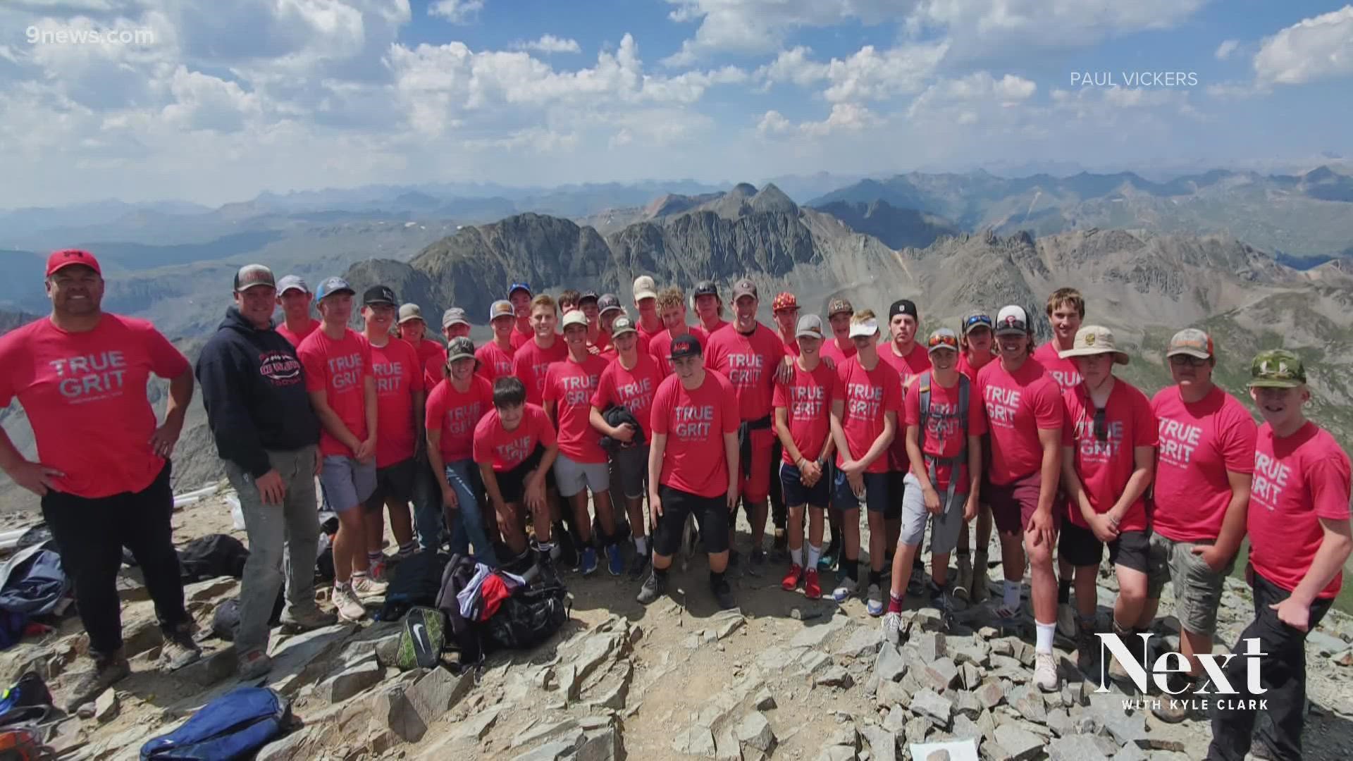 Gunnison High School football team turns team-building hike up a 14er into a memorable field goal kick on the top of a mountain.