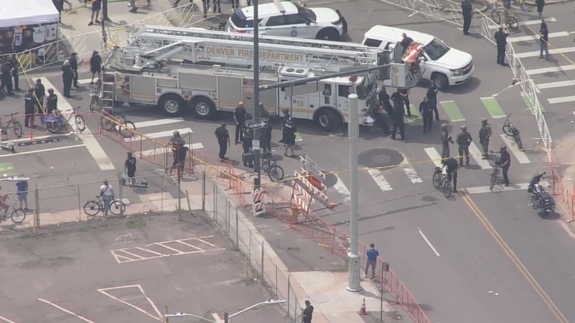 Police officer hit by firetruck during Denver Nuggets parade | 9news.com