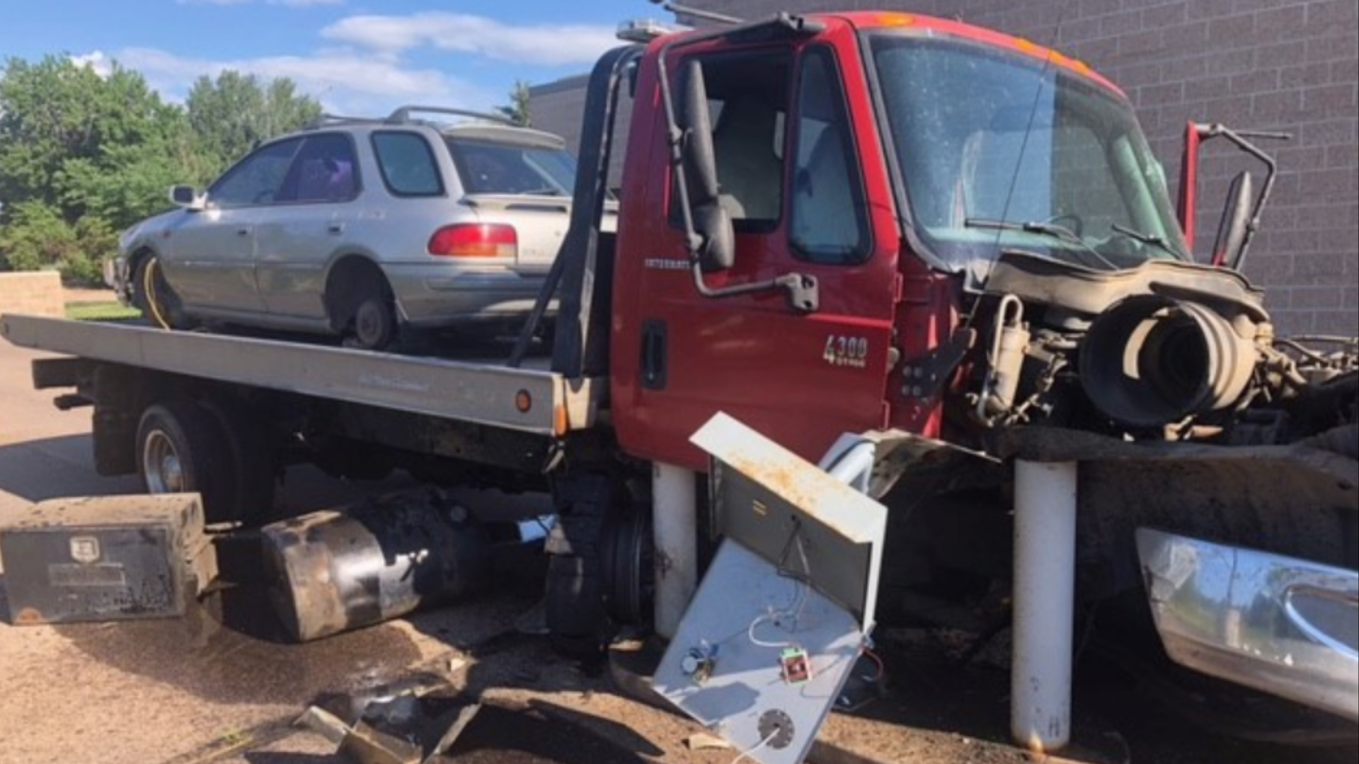 Stolen tow truck crashes into Greeley Police Department | 9news.com