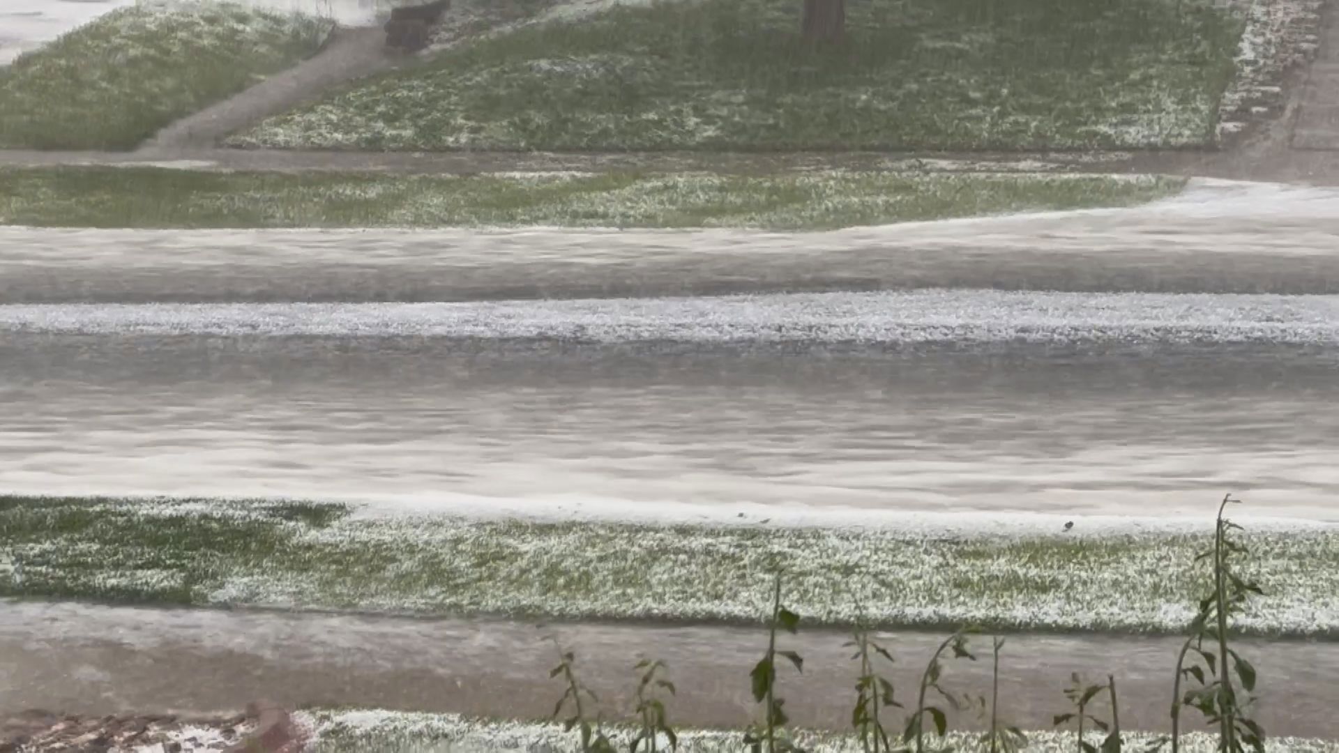 Heavy rain and hail flooded roads, driveways and yards around Aurora, Centennial and Parker Sunday afternoon.