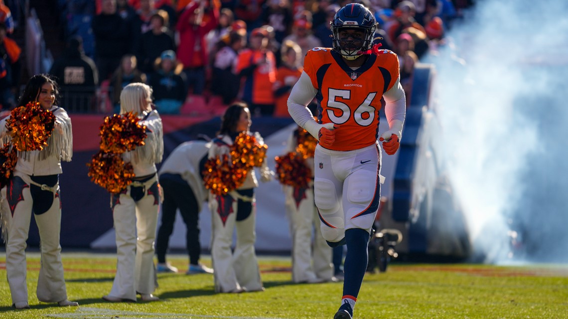 Denver Broncos linebacker Aaron Patrick warms up before a