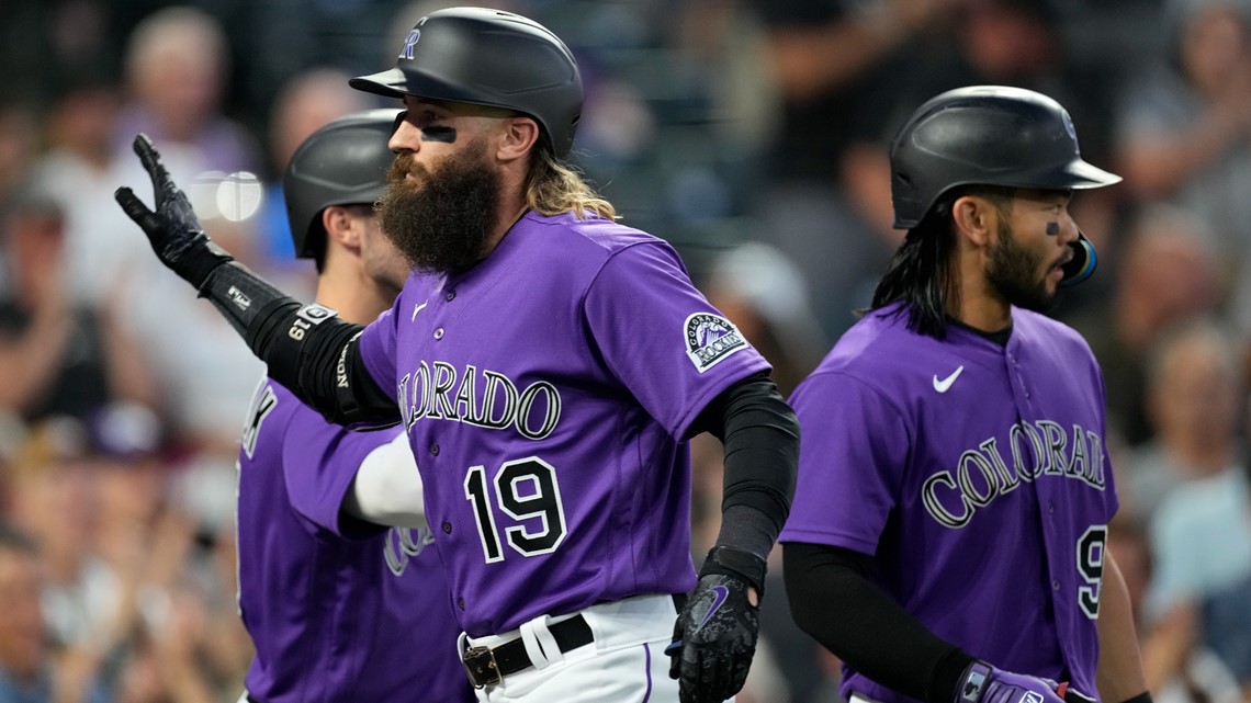 The Colorado Rockies' Charlie Blackmon marches to the beat of his