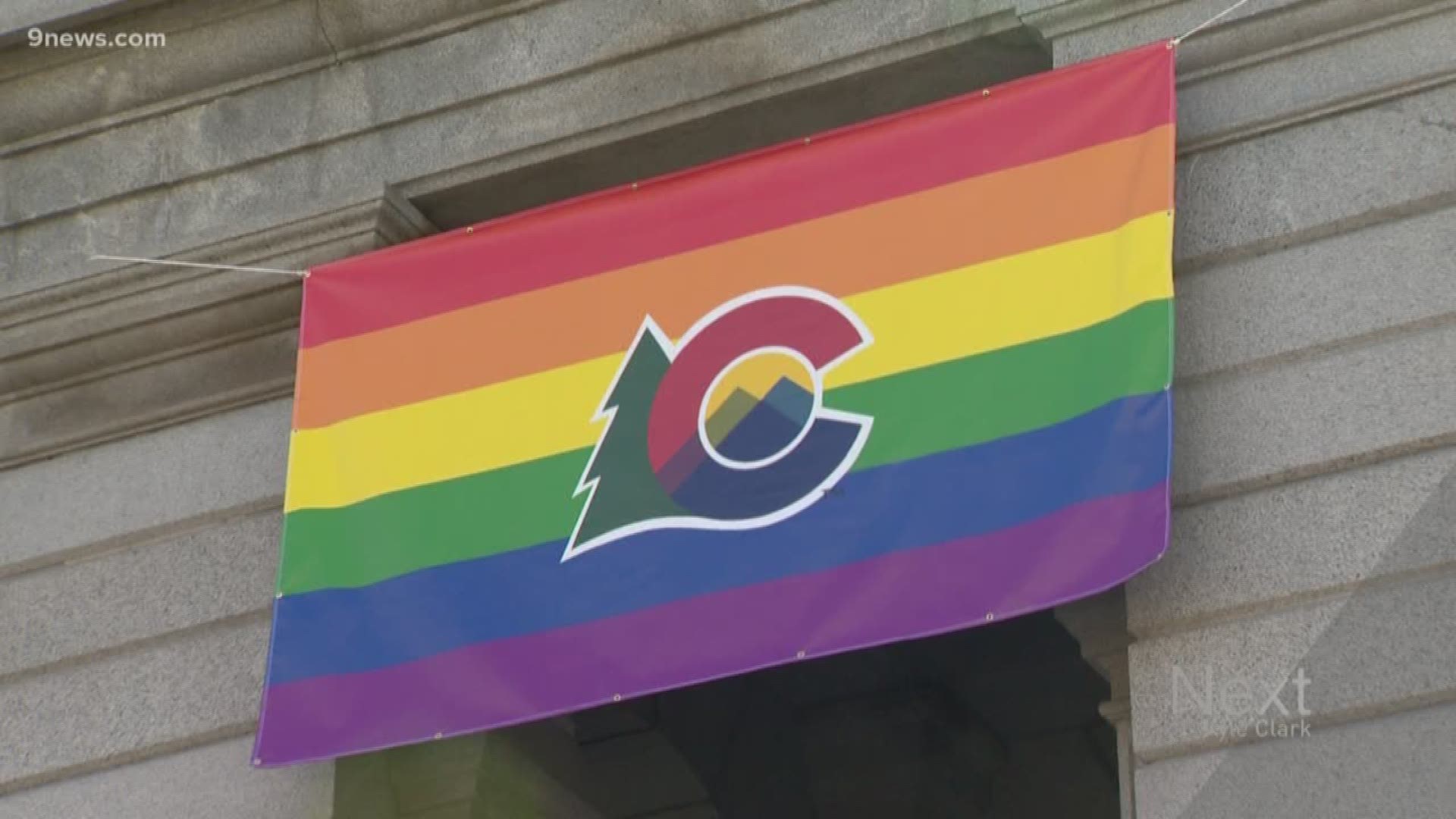 Jared Polis, Colorado's first gay governor, flies Pride flag outside