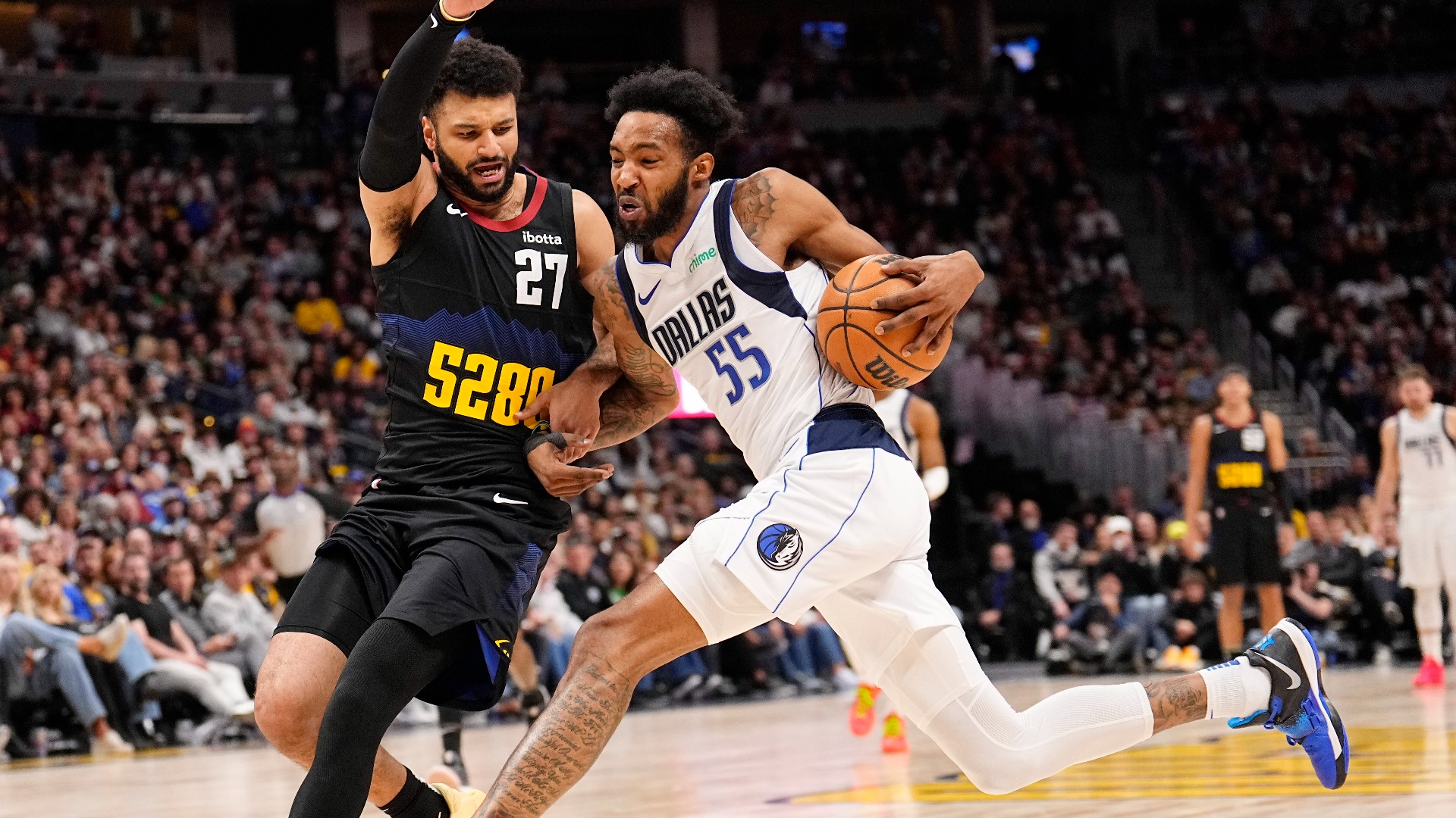 Murray scores 22 points as Nuggets race by Doncic and Mavericks | 9news.com