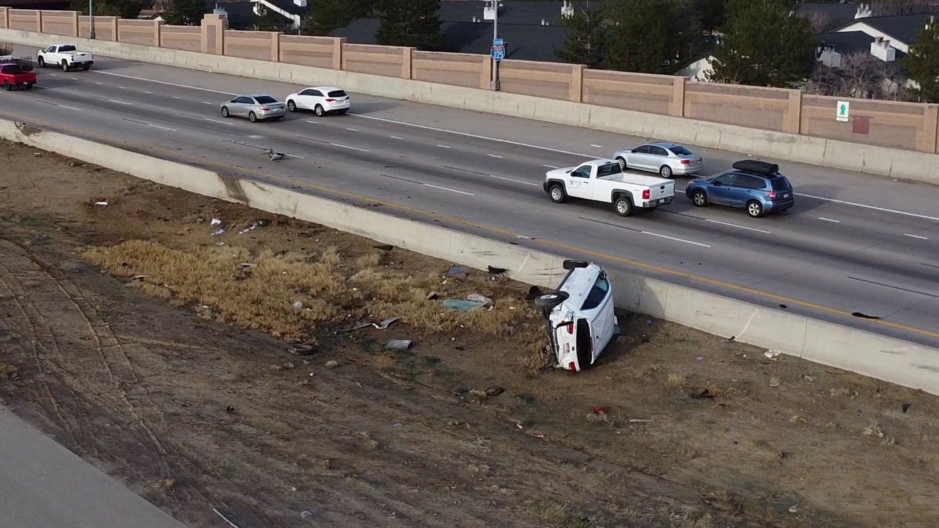 A viewer sent drone footage of the scene after five teens were ejected from a stolen car on I-225, according to Aurora Police.