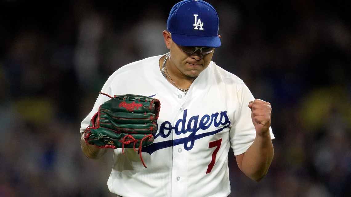 Los Angeles Dodgers pitcher Julio Urias celebrates after defeating