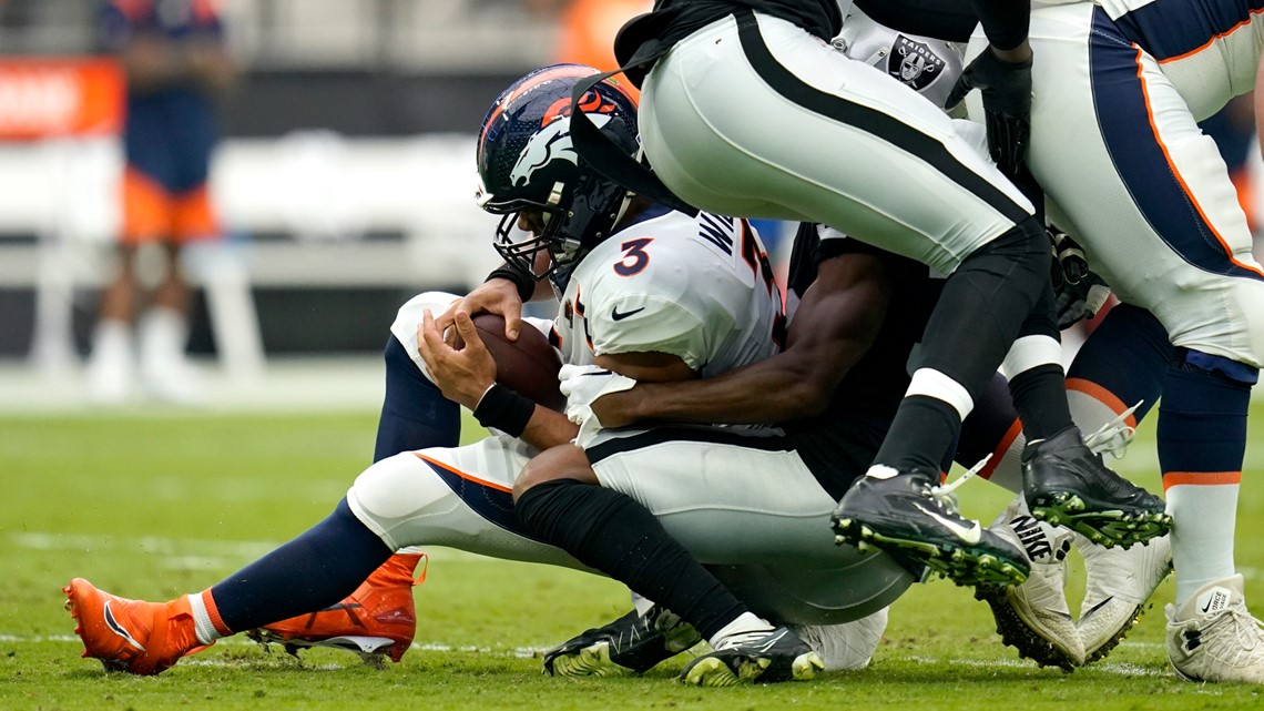 Denver Broncos linebacker Jonathan Kongbo (90) walks off the field