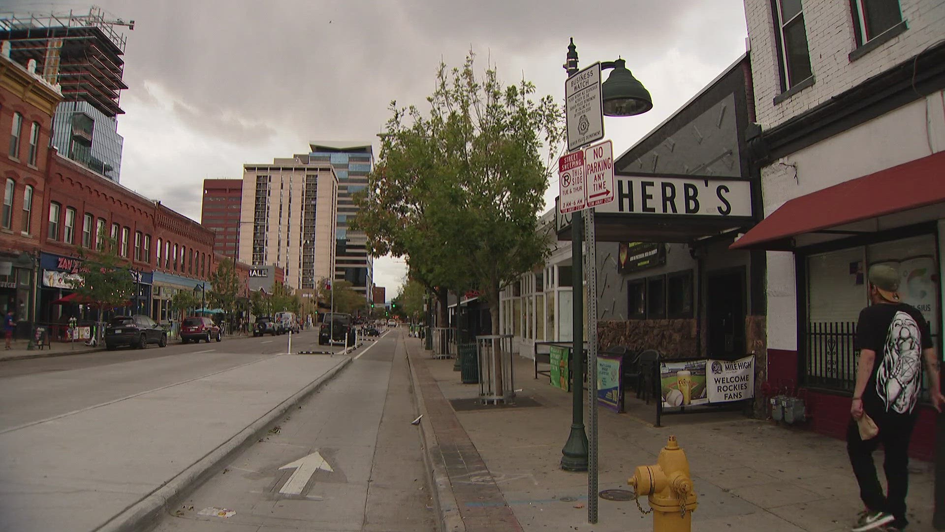 Denver police say a woman shot five people in LoDo Saturday night after being turned away from a bar on Market Street.