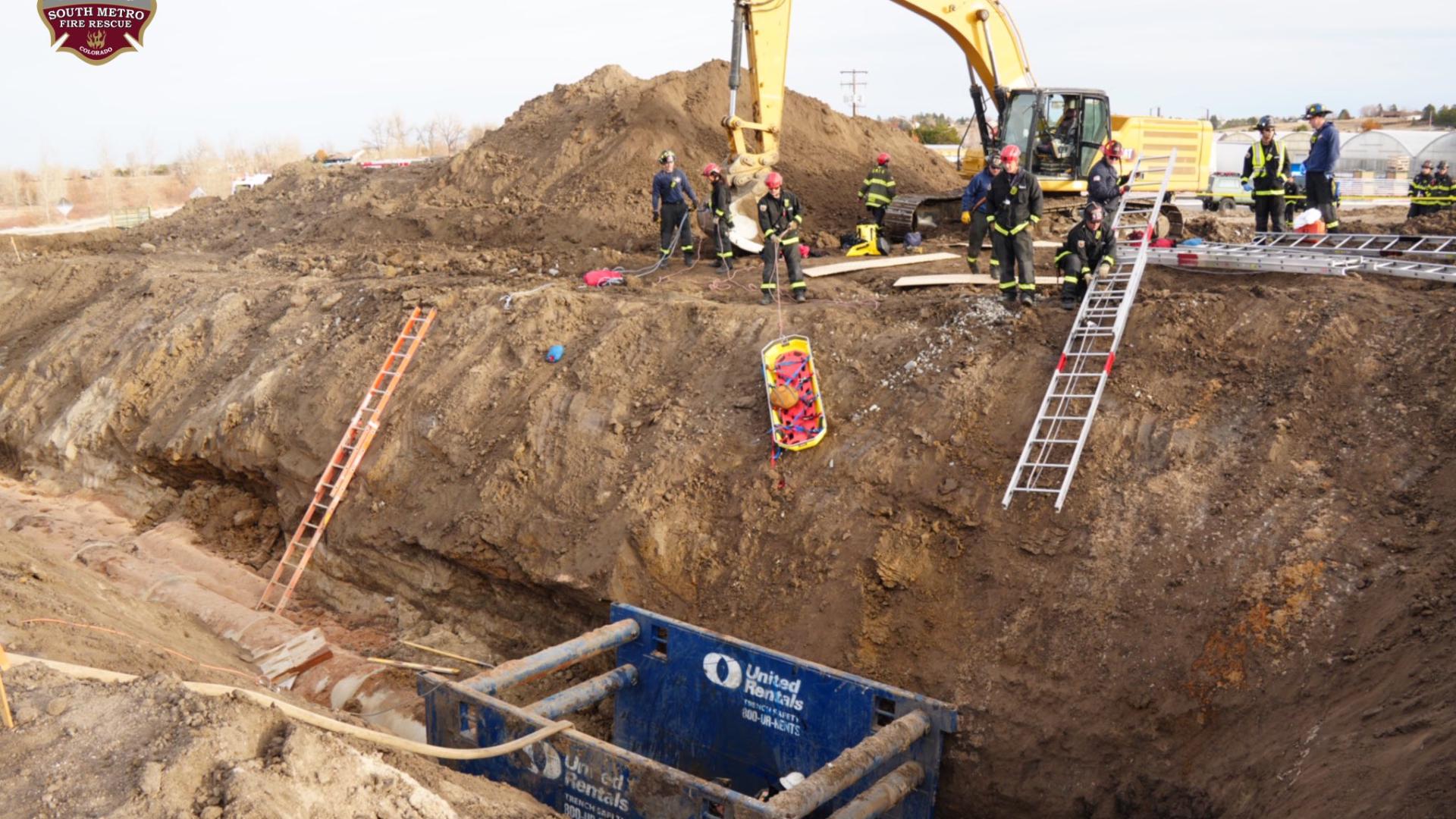 2 people trapped in trench off Cherry Creek Trail in Centennial | 9news.com