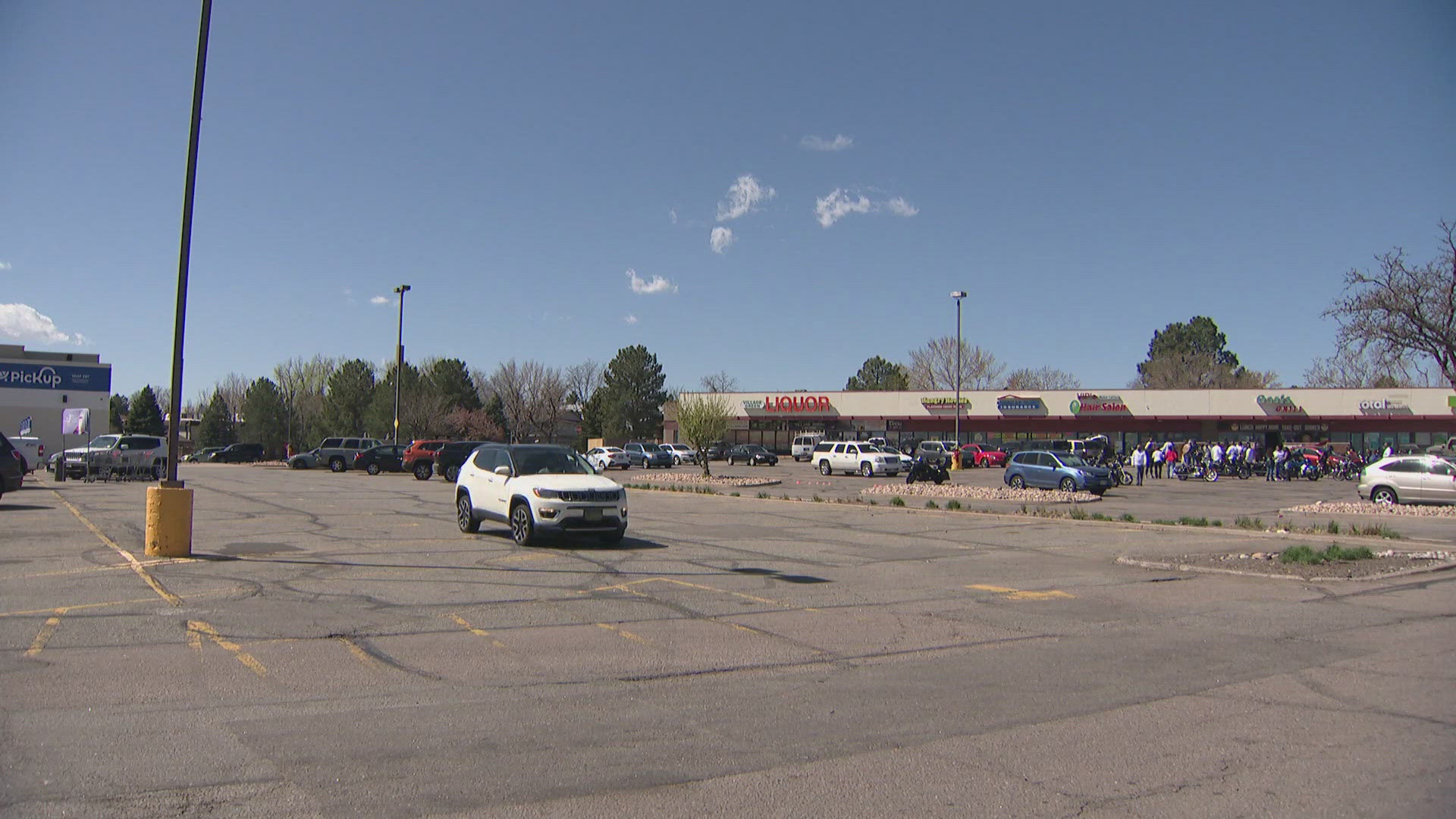 A man was killed in the shooting around 2:15 a.m. Sunday in a parking lot on East Mississippi Avenue.