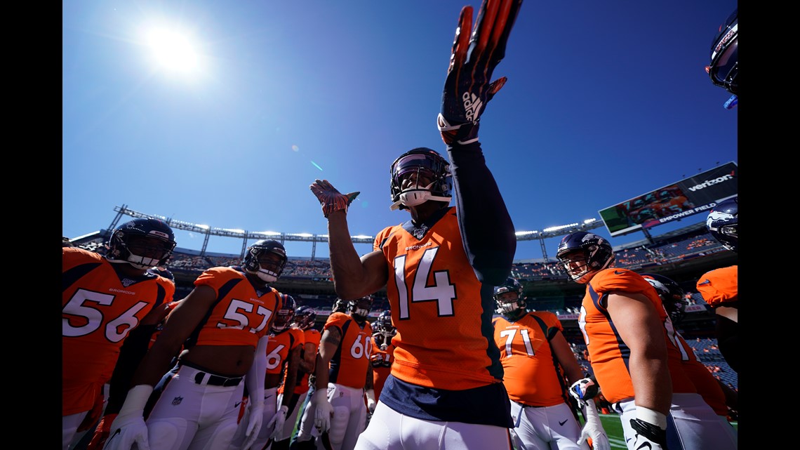 Denver Broncos tight end Andrew Beck (83) walks during a practice session  in Harrow, England, Thursday, Oct. 27, 2022. The Denver Broncos will play  the Jacksonville Jaguars in an NFL regular season