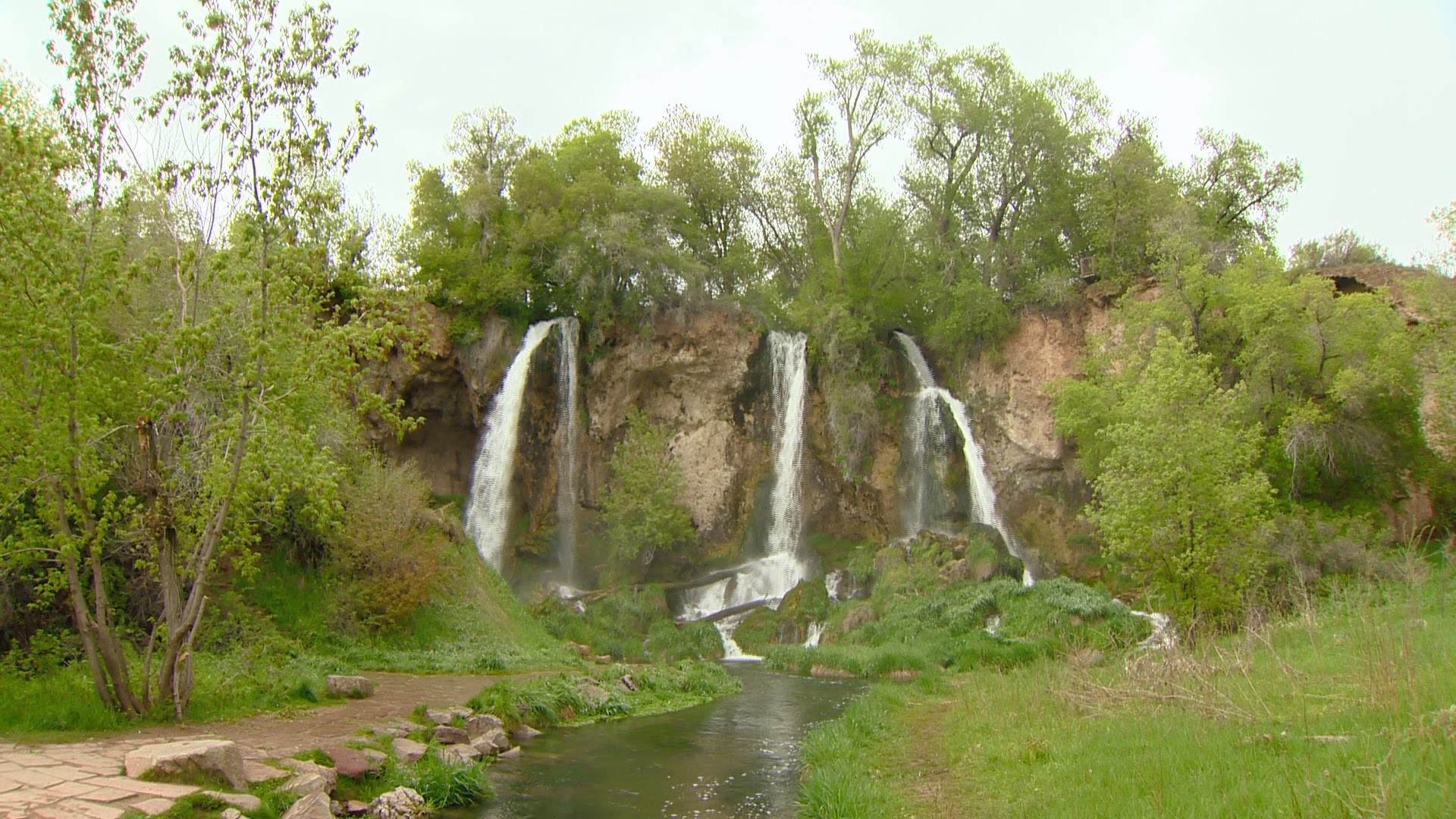 About 13 miles northeast of Rifle, Colorado, lies the stunning beauty of Rifle Falls State Park. Home to a triple 70-foot waterfall easily accessible from the parking area, there are also other trails to explore.