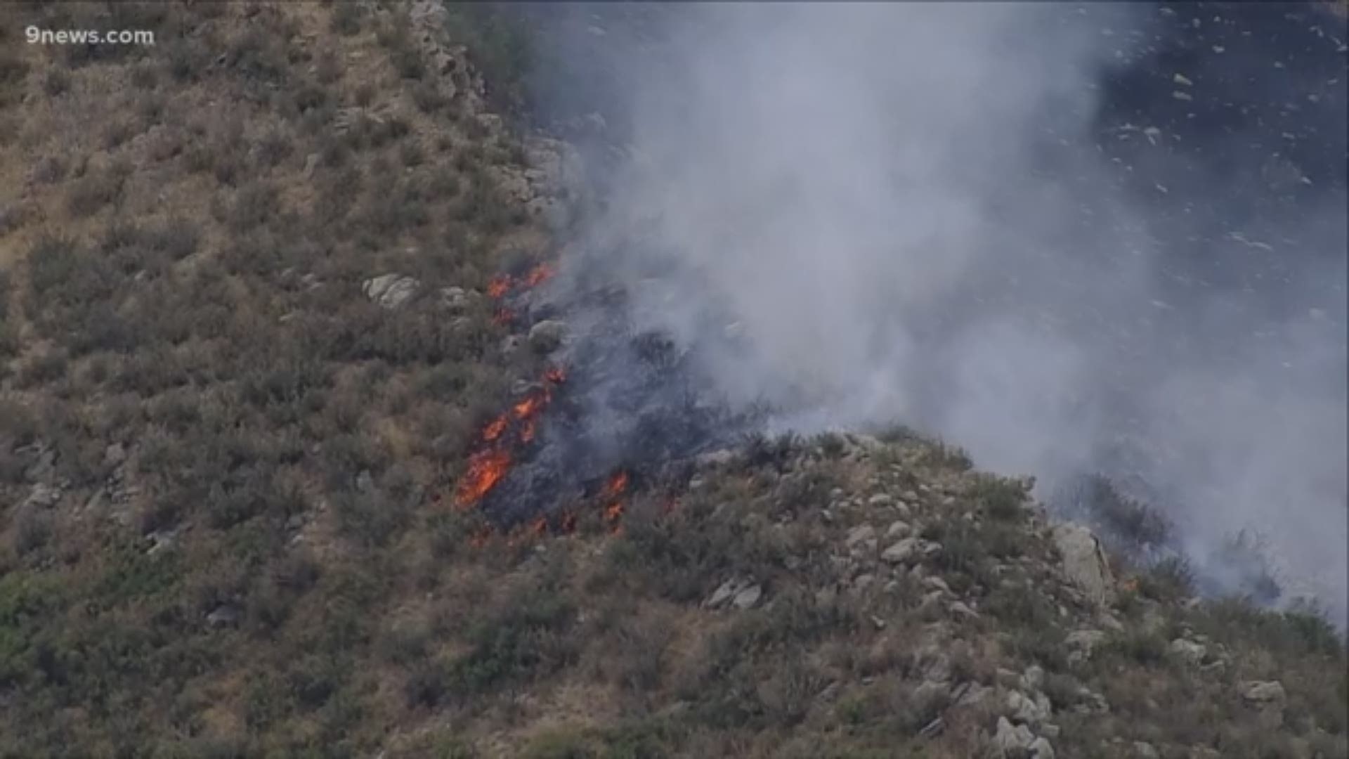 The fire north of the reservoir was first reported around 11 a.m. Thursday morning.