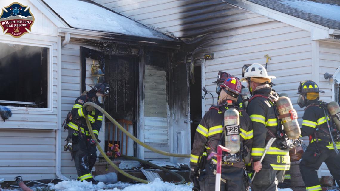 Body camera: Kids rescued from backyard of burning home | 9news.com