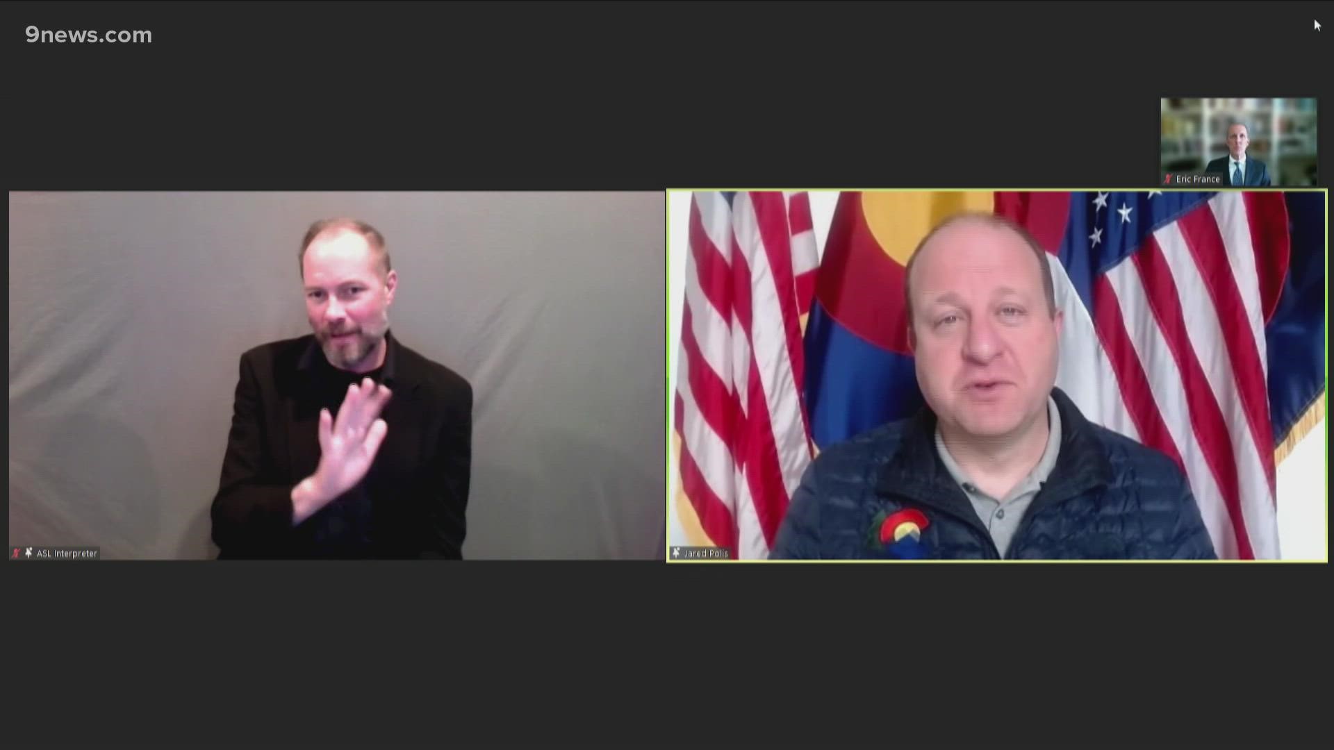 Gov. Jared Polis and Chief Medical Officer Dr. Eric France hold a briefing on COVID-19 in Colorado on Dec. 29, 2021.