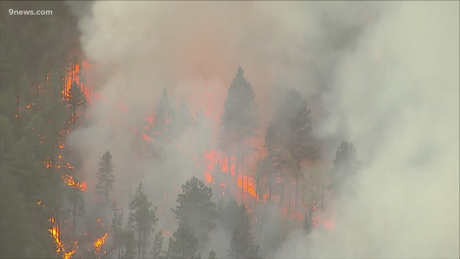 The fire grew more than 100,000 acres in one night, forcing entire towns to evacuate and killing two people.