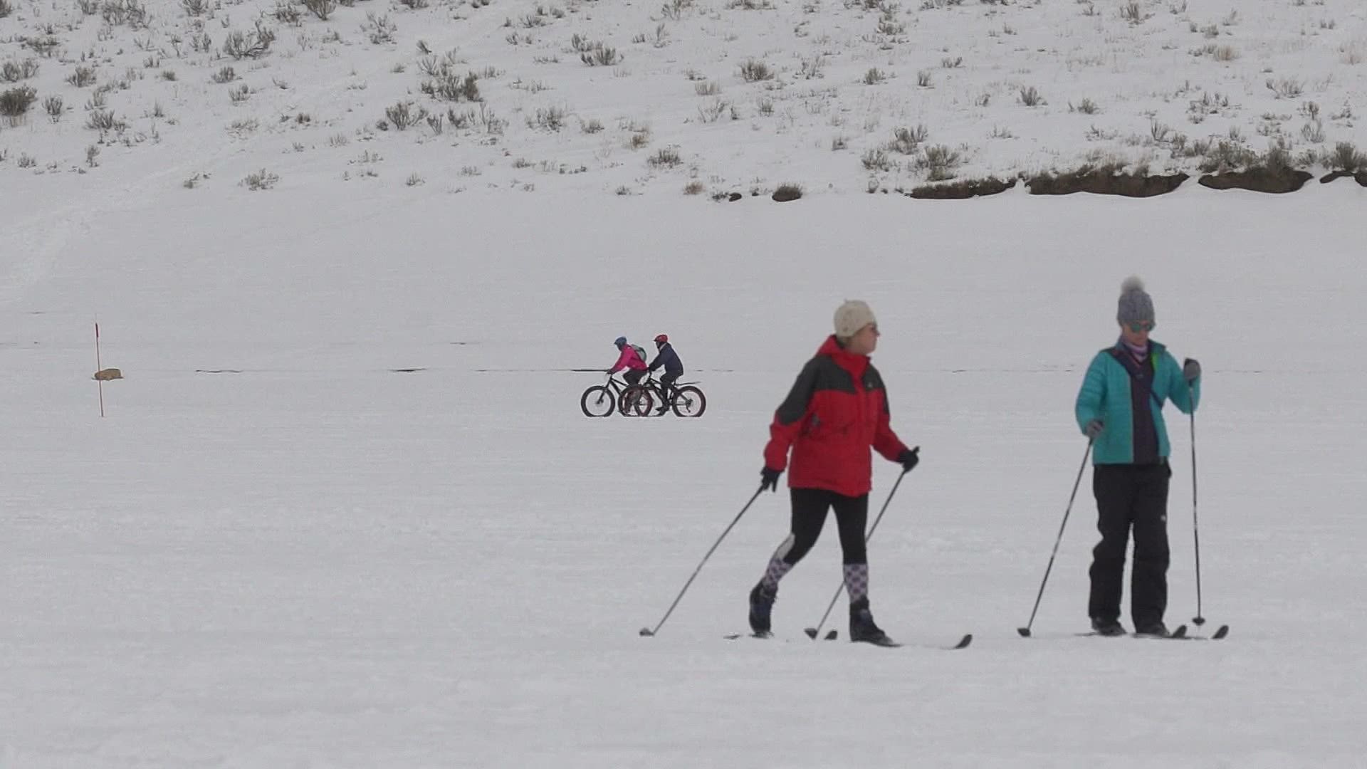 A new trail system loops around the lake letting people cross country ski, snowshoe and hike across the ice and snow.