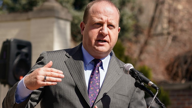 Polis throws cold water on public unions bill