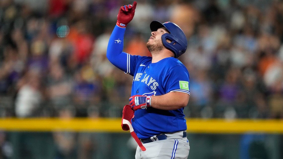 Three homers by Toronto power the Blue Jays past the Rockies