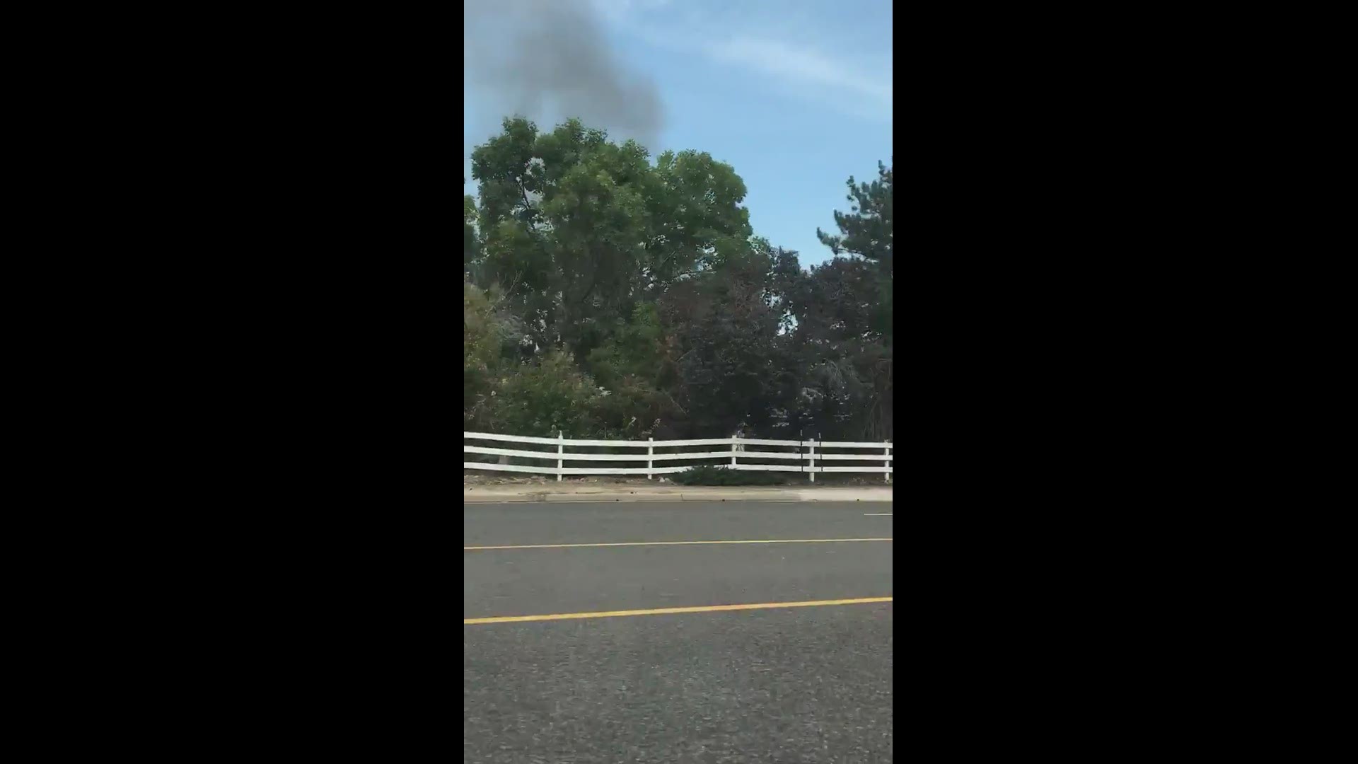 RAW: A look at smoke from a fire at the old White Fence Farm in Lakewood. (Video courtesy: @MimiDoesLife via Twitter).