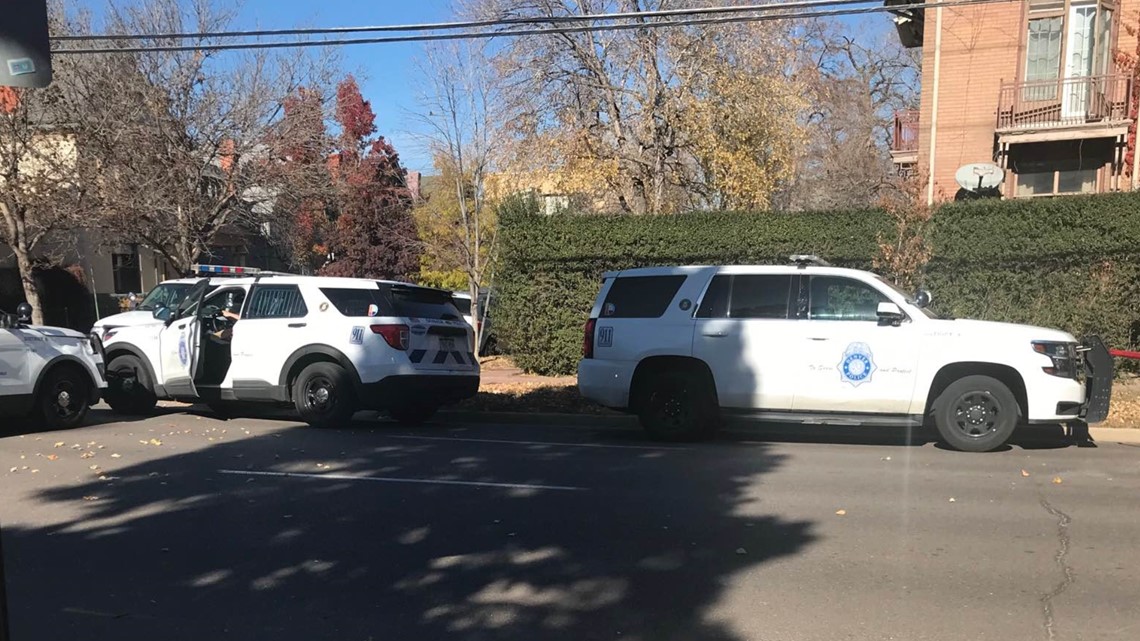 2 officers dragged by car theft suspects in Denver | 9news.com