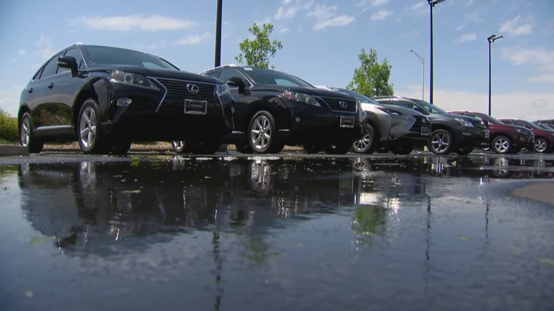 Hundreds of cars damaged by hail at car dealership