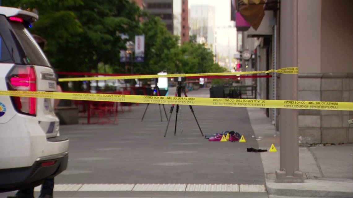 Two officers shot the suspect in another shooting in the area of 16th and California streets, Denver Police said.