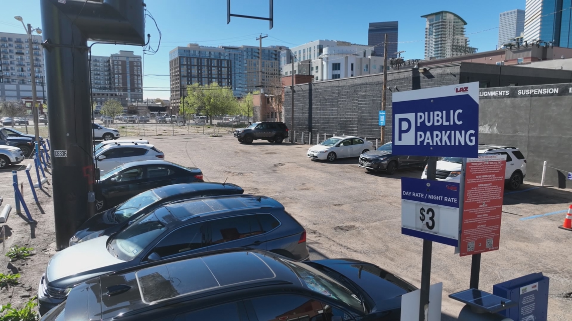 Woman ticketed twice for parking over faded lines in Denver lot