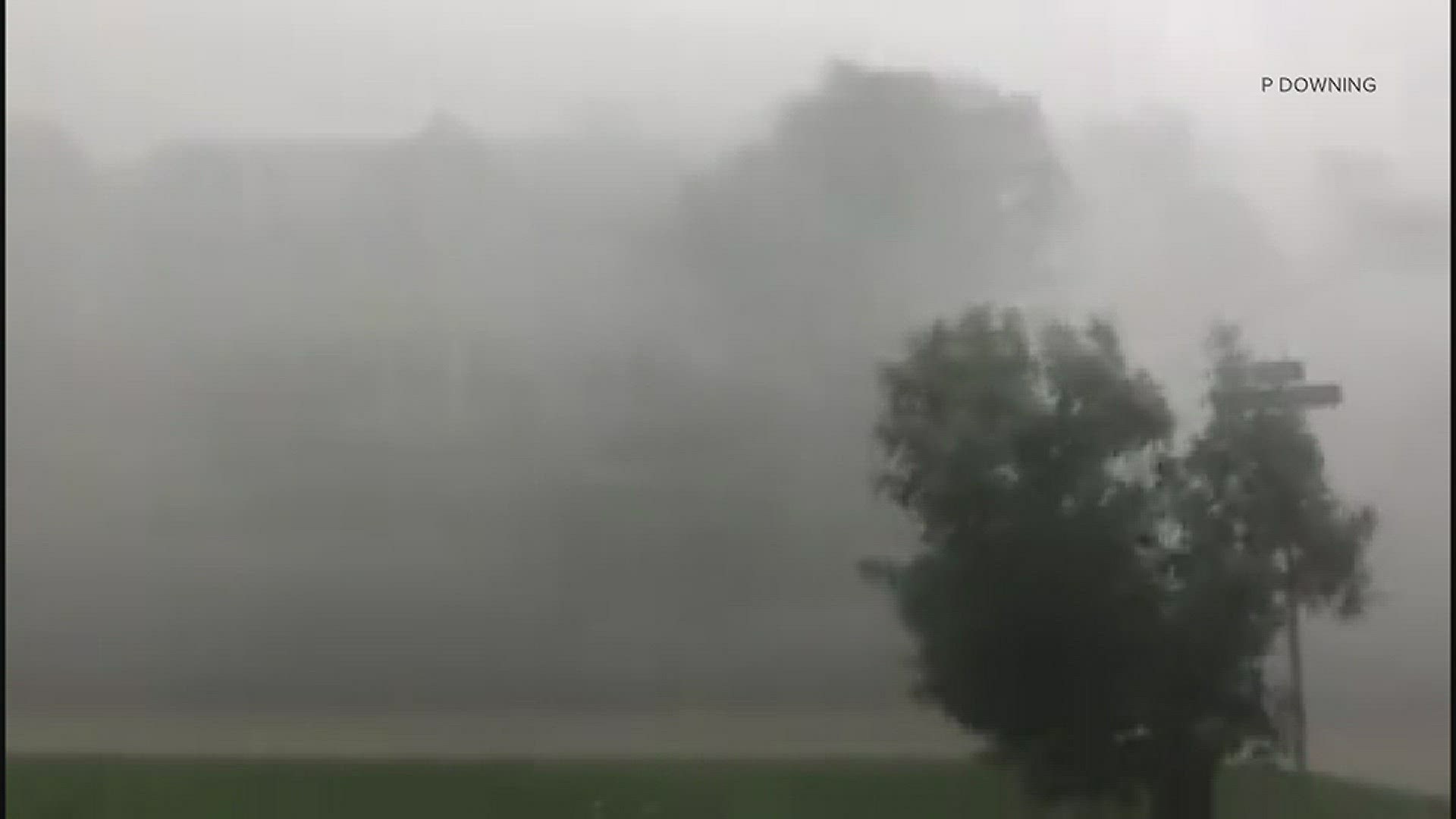 Viewer video from Highlands Ranch shows strong winds and blowing rain when a tornado touched down on Thursday.