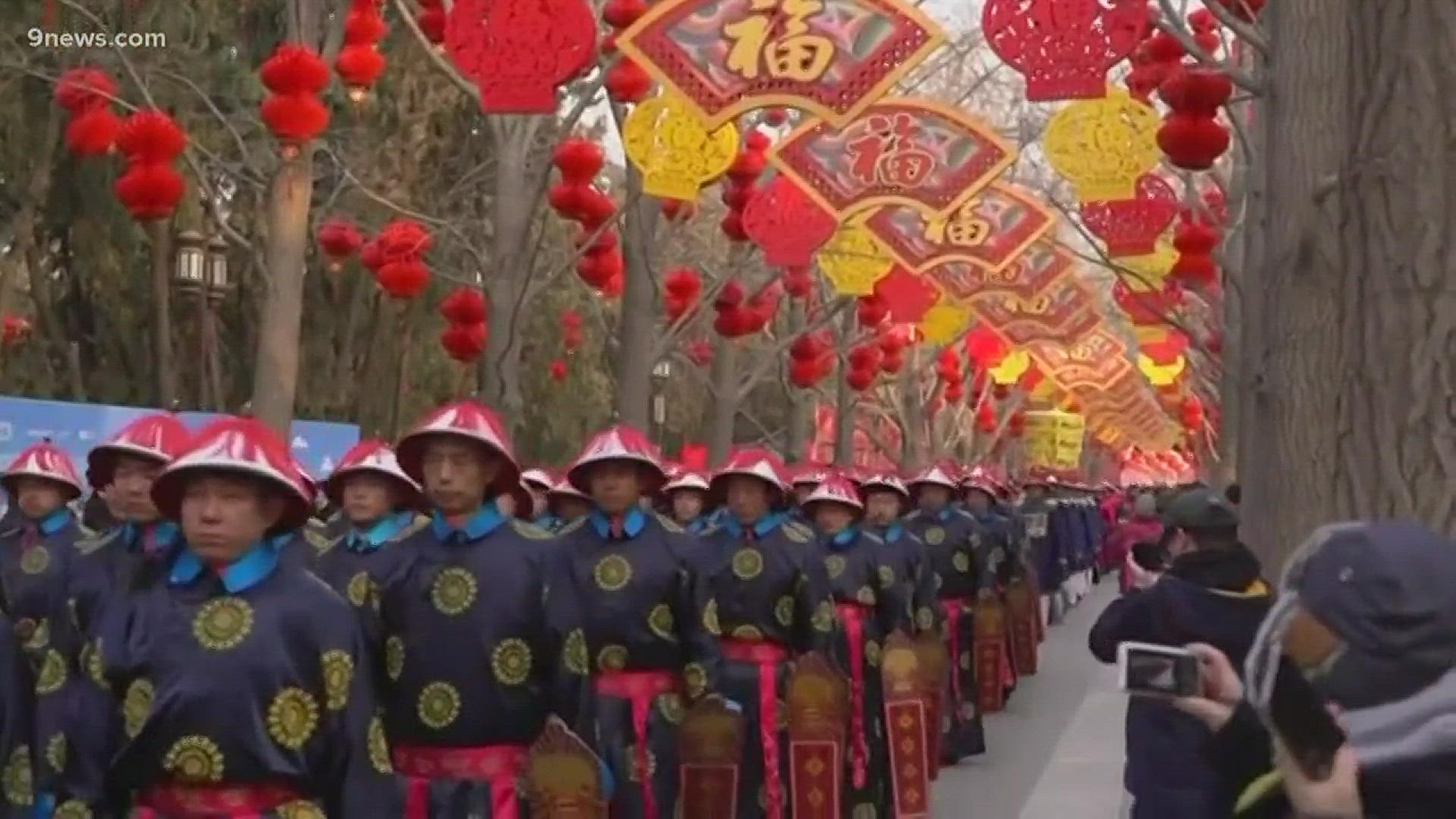 Lunar new year celebrations for the "Year of the Pig" kicked off Tuesday in China. Thousands of people in Beijing watched traditional parades and ceremonies to celebrate.
