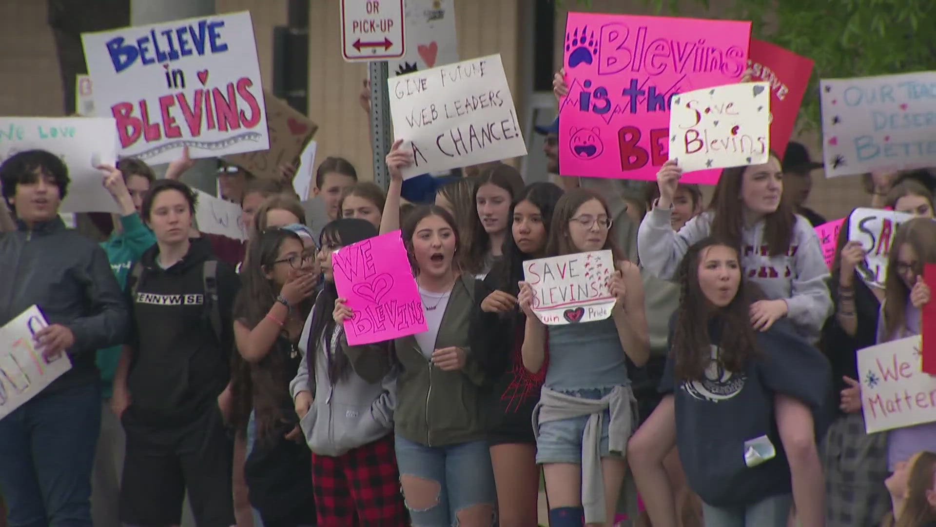 Students at Blevins Middle School, one of the schools on the district's chopping block, walked out of class today and chanted "save our schools."