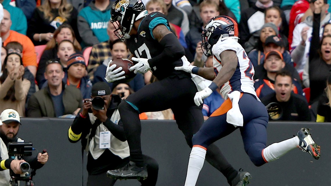 Denver Broncos orange-blue stripe uniform combo returns vs Titans