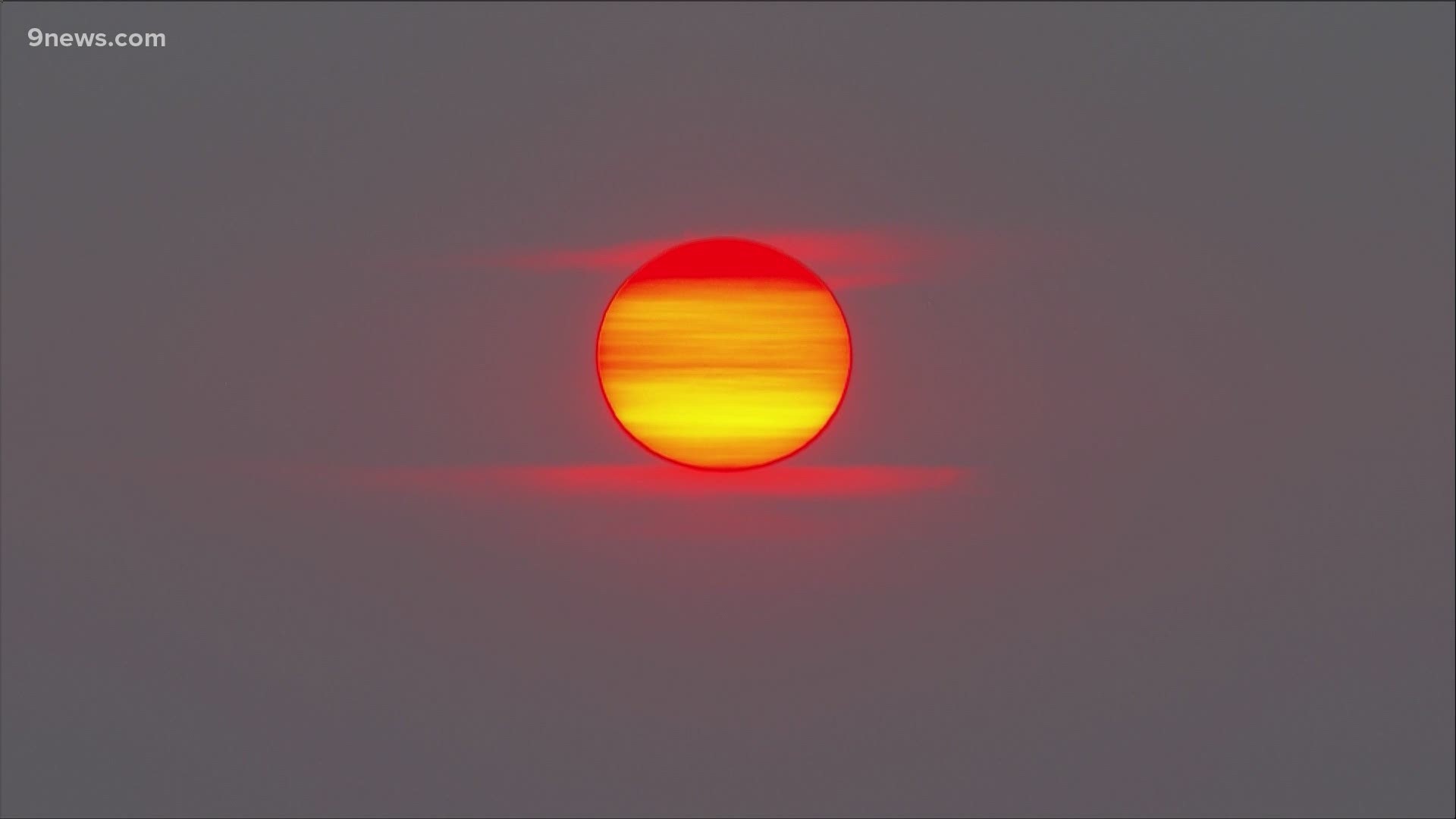 Check out the large, orange sunrise above Denver, Colorado on Tuesday, July 20, 2021.