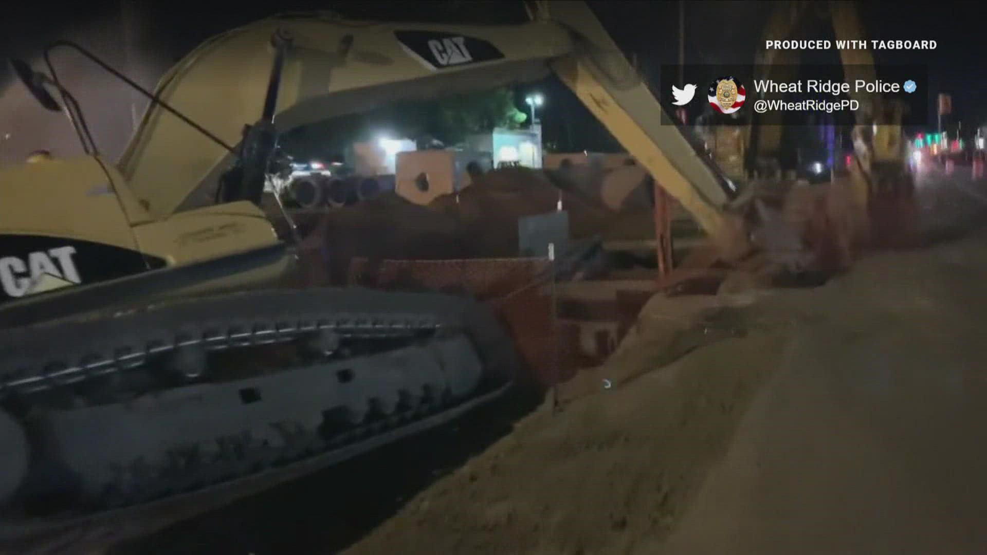 An unoccupied excavator fell into a hole at a construction site and onto a water main. Wadsworth Boulevard was completely shutdown at 40th Avenue.