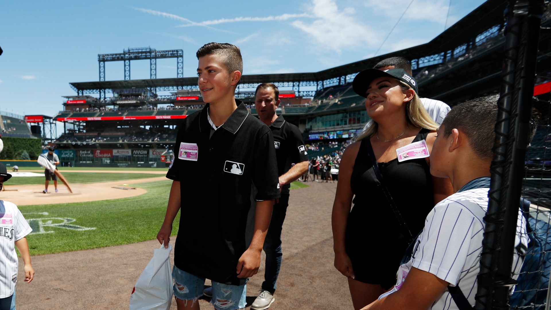 MLB umpire invites youth baseball umpire to Coors Field after a brawl