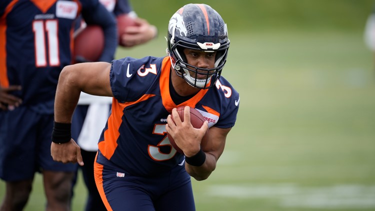 Wilson scatters, throws red zone TDs in Broncos' OTA debut