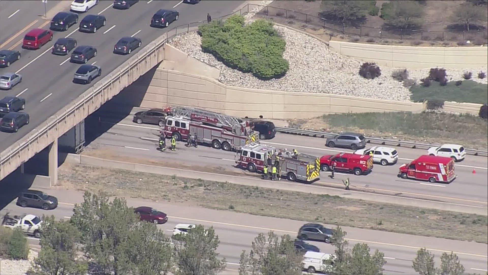 The crash involved two semis and a sedan. One northbound lane has reopened, police said.