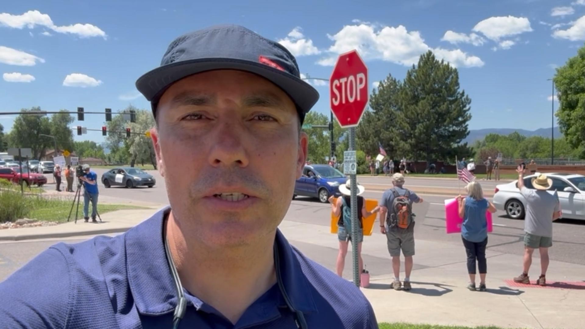Littleton residents gathered to protest against President Donald Trump and his policies Saturday as part of the nationwide "No Kings" demonstrations.