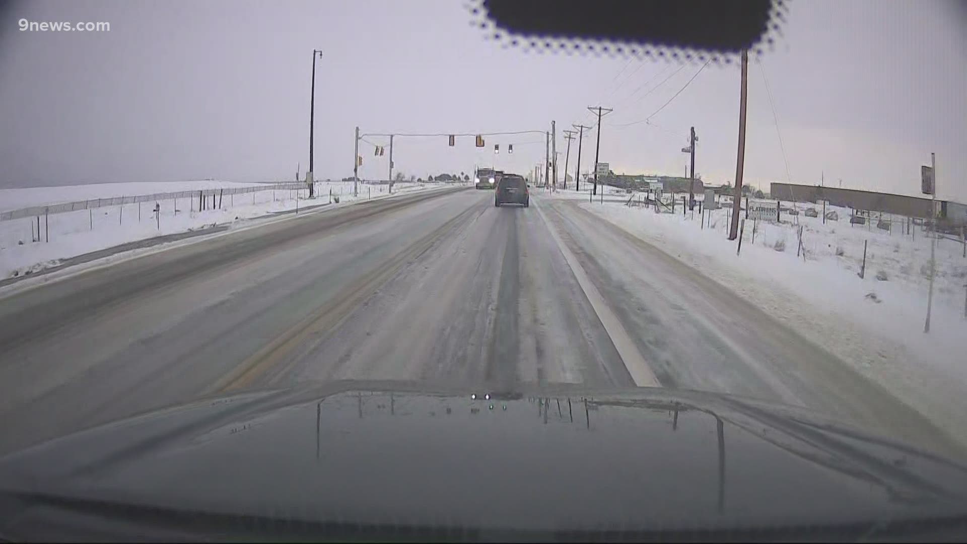 9NEWS reporter Jordan Chavez has a look at wet road conditions Wednesday morning along Highway 93 near Boulder.
