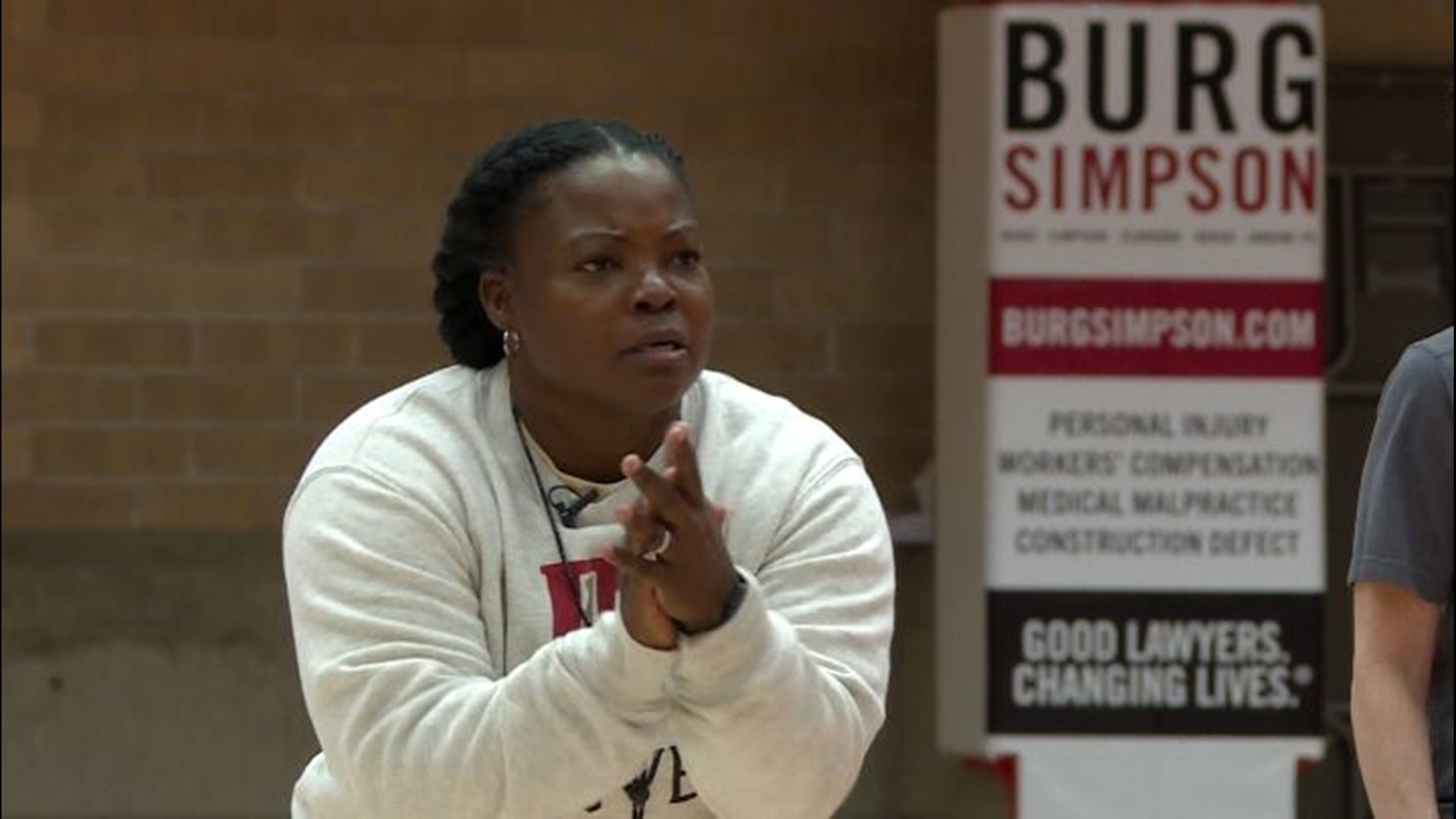 The Denver women's basketball head coach refuses to live a life as a victim of her past environment and instead thrives as an inspiring role model for her athletes.