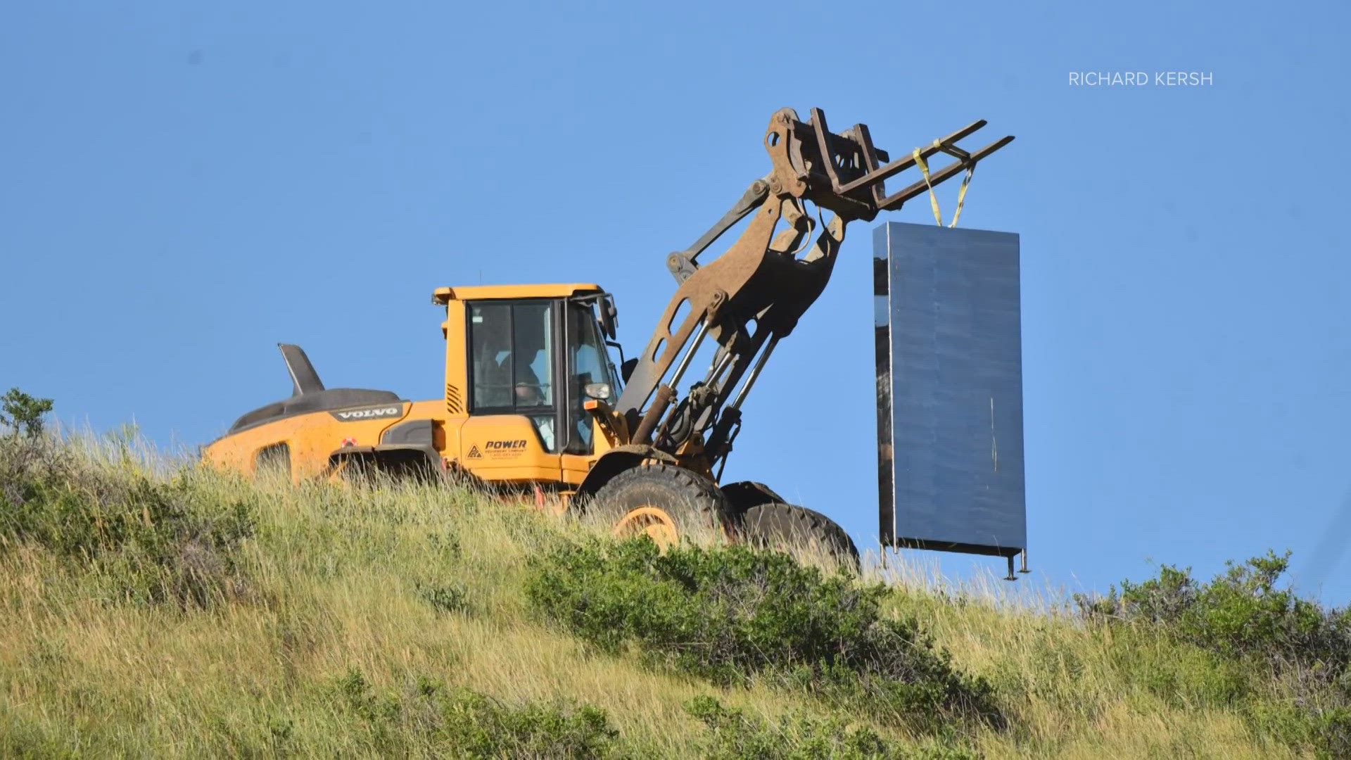 A monolith that mysteriously appeared on a hill at a northern Colorado dairy farm has been removed.
