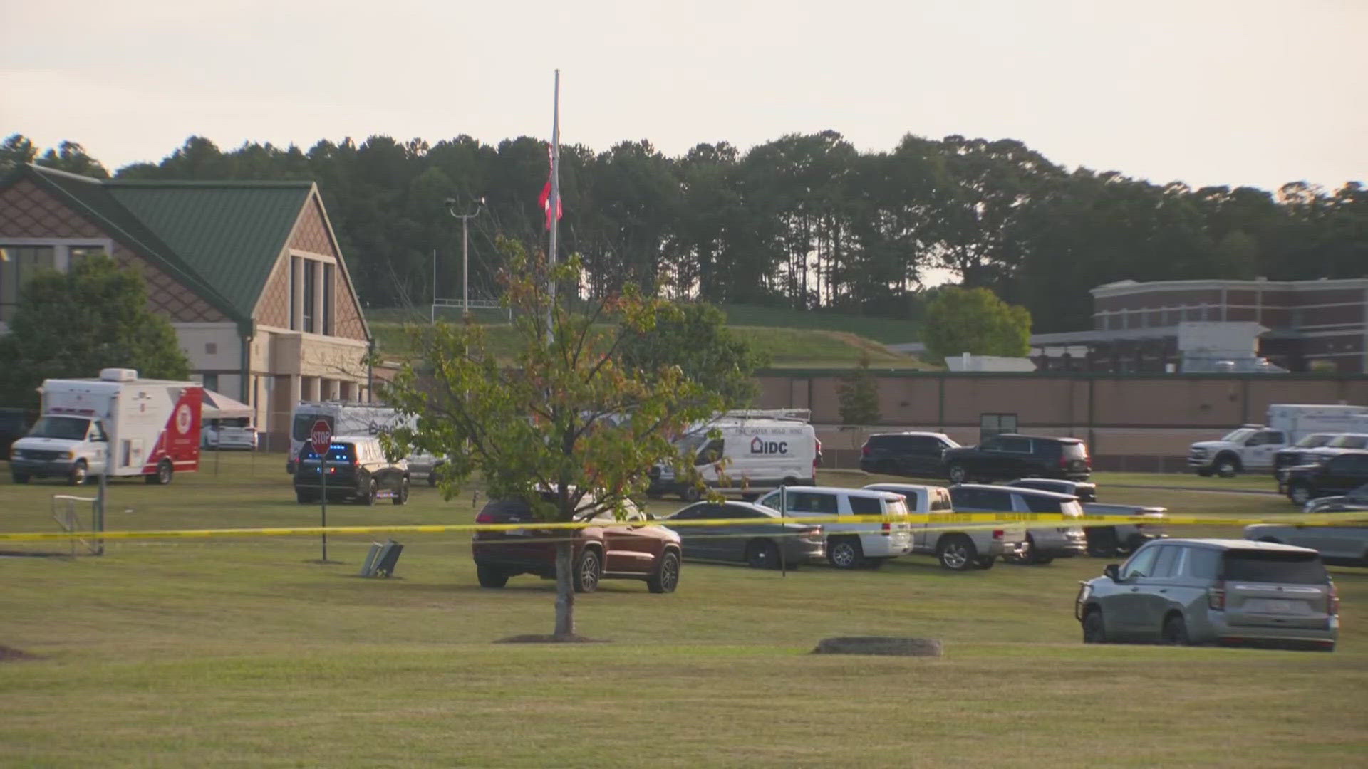 Two students and two teachers were killed in the shooting, officials said.