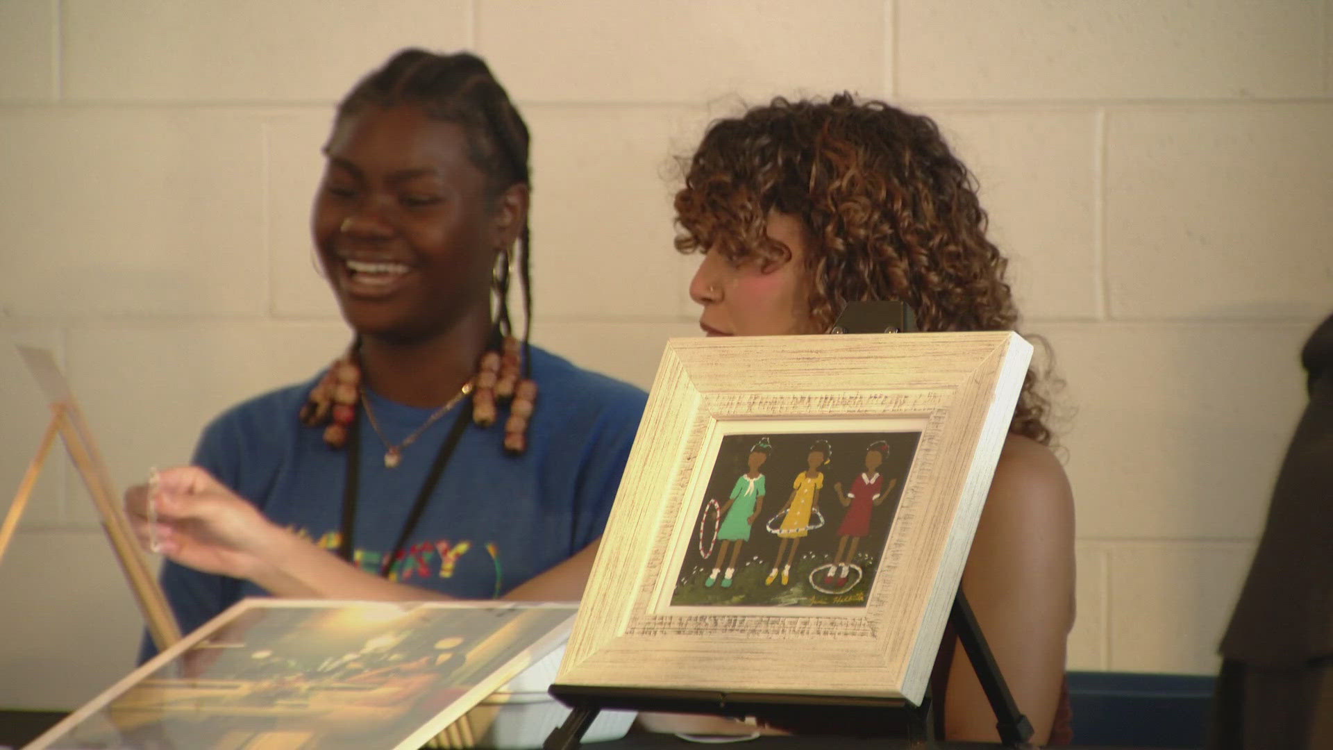Students got $500 to buy new art for their schools.