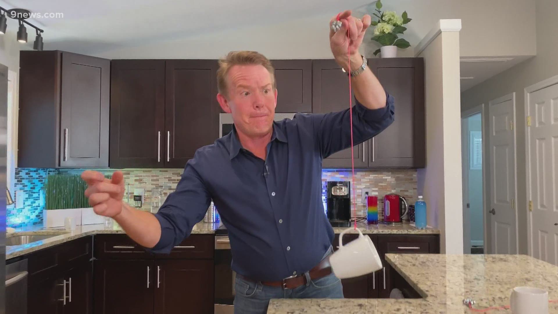 Steve Spangler turns his coffee cup into a swinging pendulum in today's science minute.